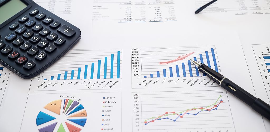 budget sheets on table with calculator